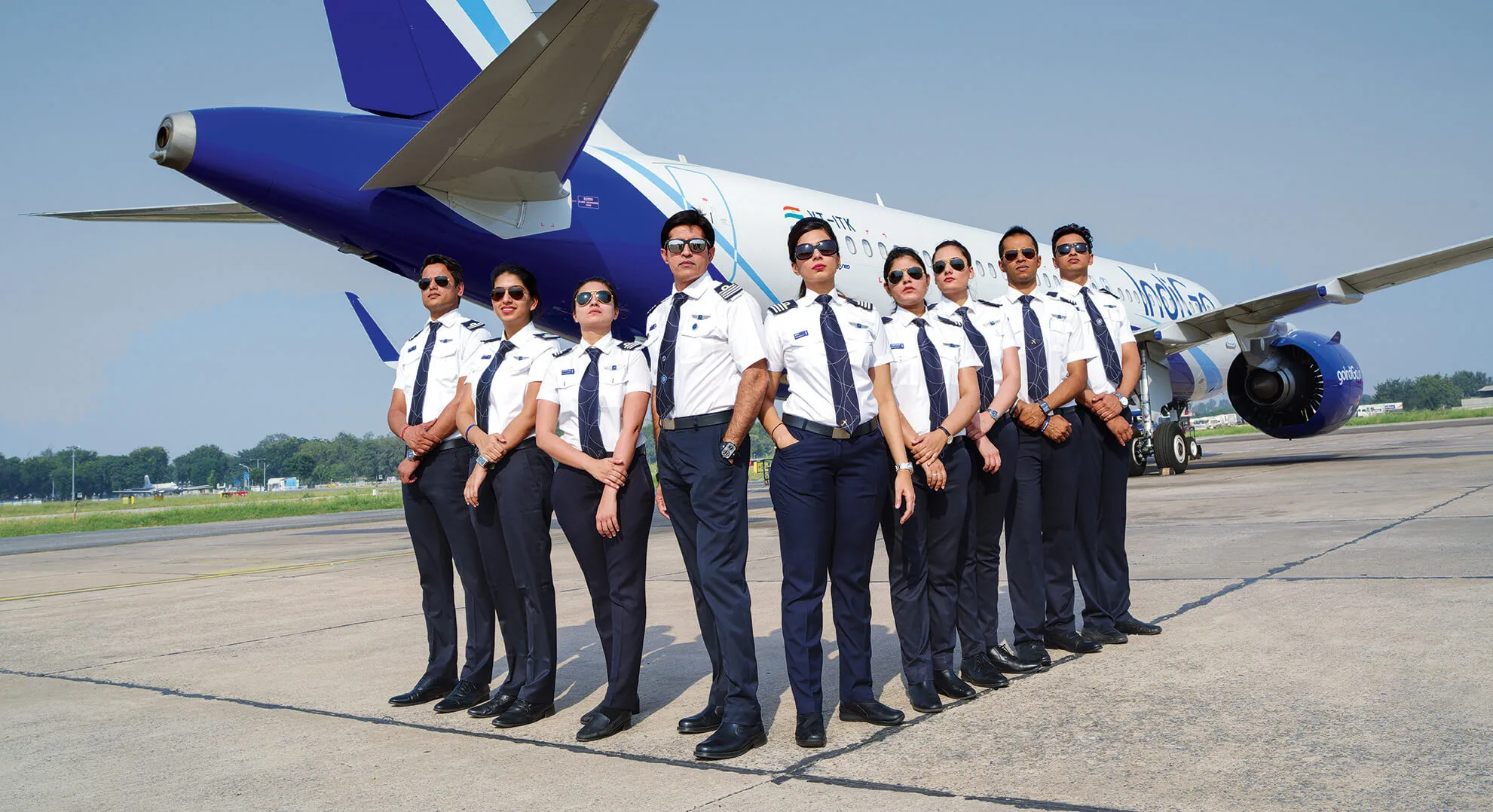 skyborne indigo cadets in front of a plane